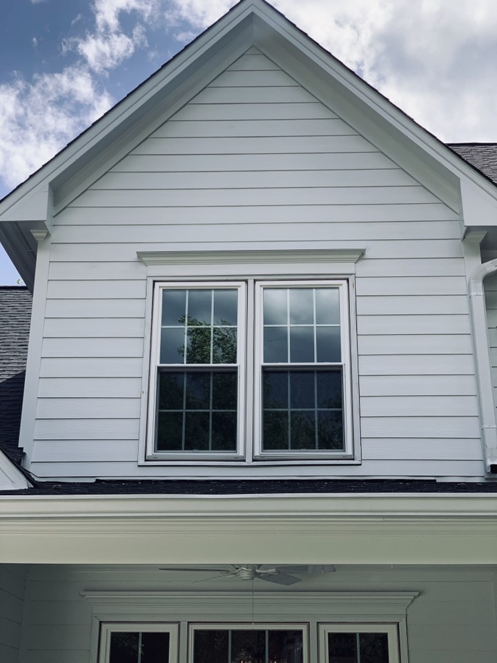 home getting replacement James Hardie siding in Raleigh, NC