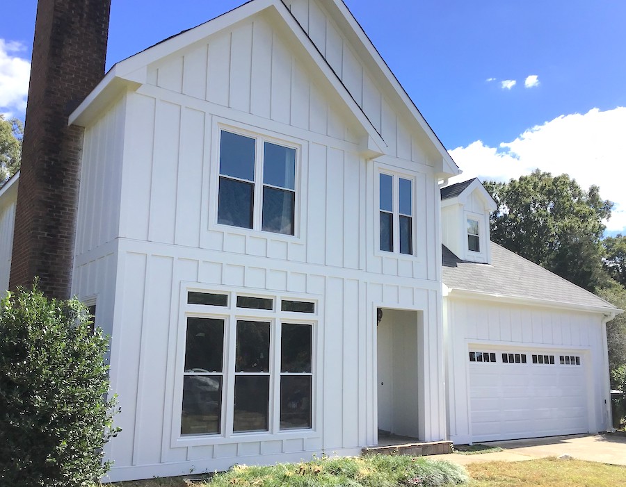 New arctic white James Hardie board and batten siding on a home in Raleigh
